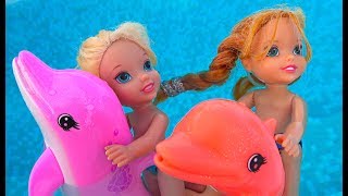 Elsa and Anna toddlers boat trip with Barbie and Skipper, playing with dolphins and fun!