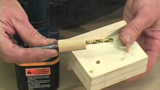 Learn how to build a simple jig for drilling perfectly aligned holes for furniture shelf pins. Visit http://www.FineWoodworking.com for 