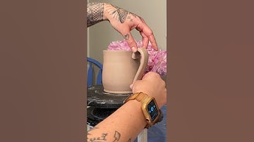 Let’s attach a handle.....#ceramicmug #potterymug #mugs #clay #potterystudio #potterydesign #artist