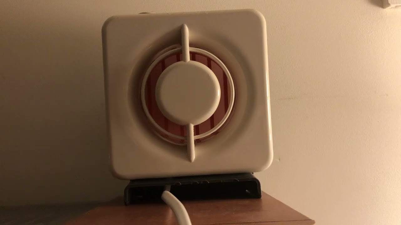 The 1981 Xpelair personal cooler desk fan at the back With the original DX100 cover No talking 