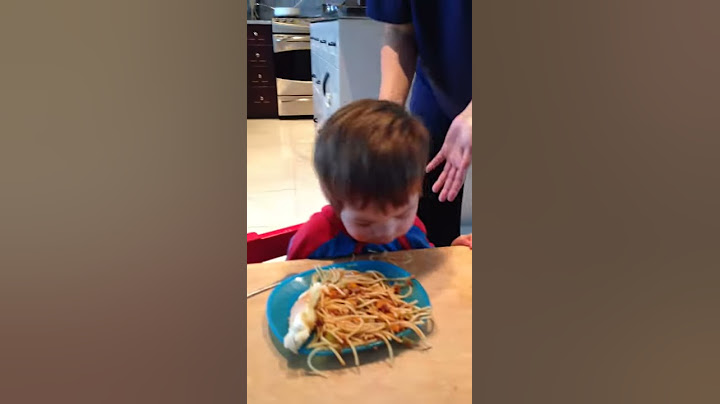 Child falling asleep in food