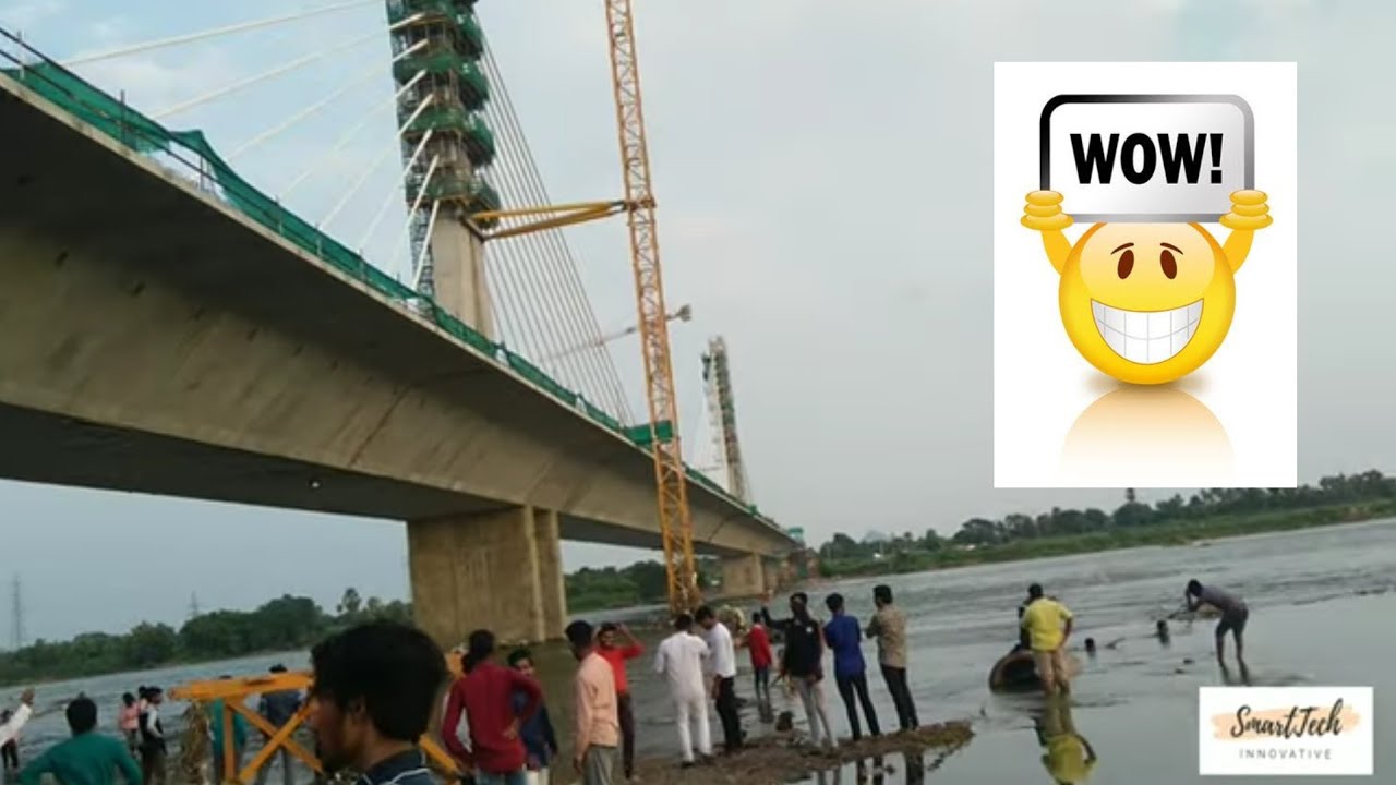 People are enjoying at water under Karimnagar Suspension Bridge Part