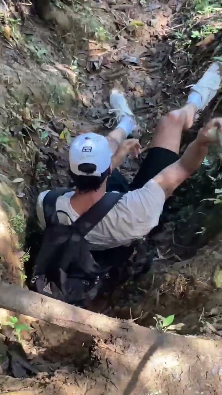 Man Feeling Goofy Jumps Into Muddy Hole || ViralHog
