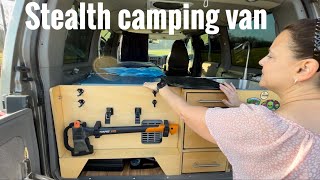 Stealth camping van woman