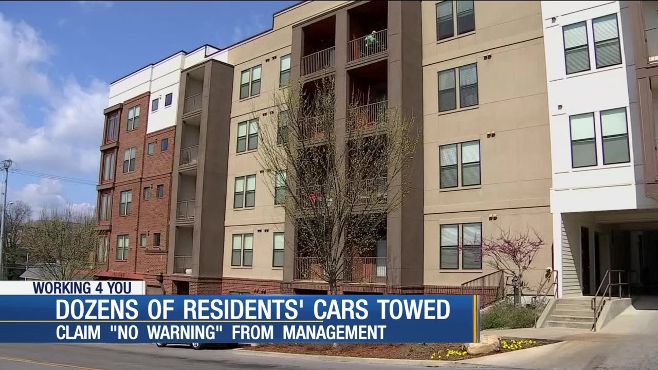 Residents say apartment complex towed dozens of cars without warning