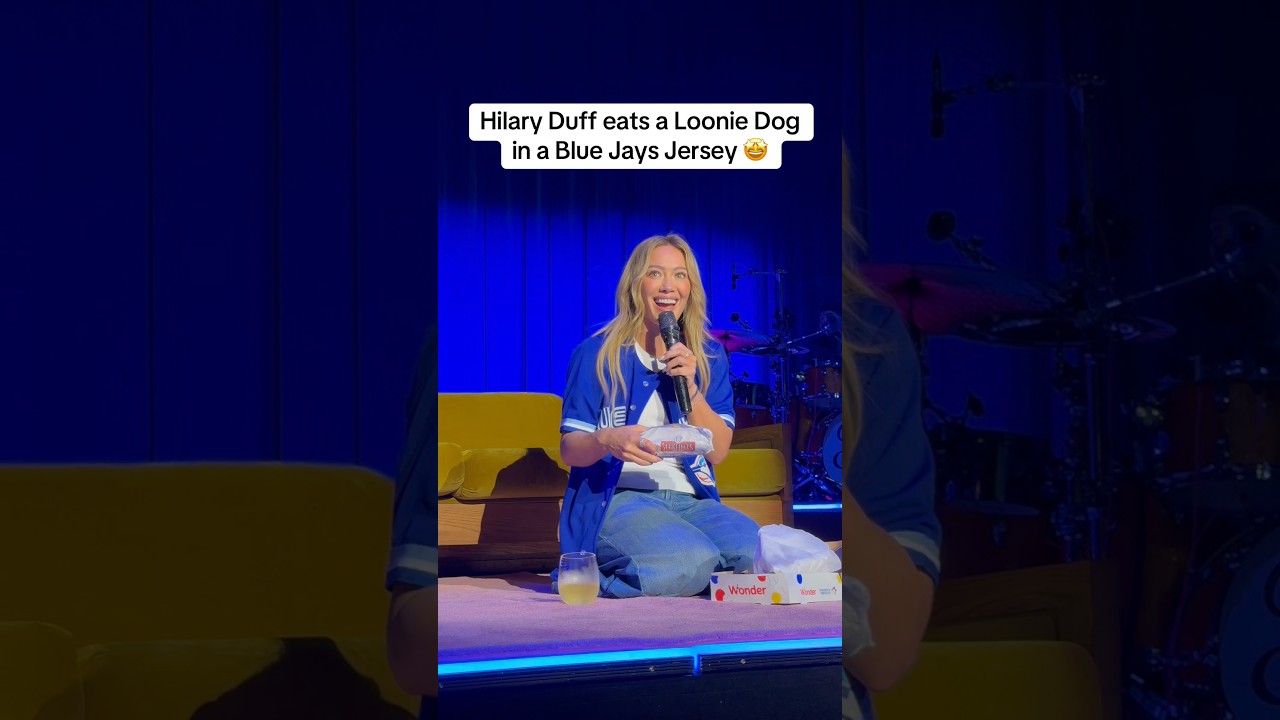 Hilary Duff in a Joe Carter jersey and eating Loonie Dogs is What Dreams Are Made Of #MLB #BlueJays