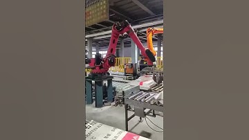#palletizing robot  The stacking robot, equipped with a fork fixture, is used in work.