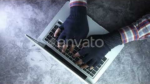 Hacker Hand Stealing Data From Laptop Top Down | Stock Footage - Envato elements