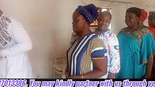 Rev. Mark Chuks feeding the needy.