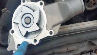 Water pump and thermostat replacement. 2001 Jeep Grand Cherokee