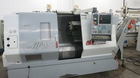Haas SL-30 CNC Turning Center w/Haas Servobar 300 Barfeeder - 2001