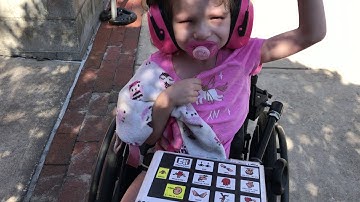 Harper and Mom communicating with PODD