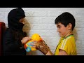 Celina pretend to be Super here and takes her toys - سيلينا بطلة خارقة تاخذ الالعاب من حسونة