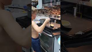 Impressive Pancake Flip and Catch by a Skilled Boy