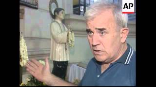 Cardinal warns people not to kiss statues, priest bites
