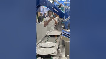 Automated plate handling by @YASKAWAeurope at @AUTOMATICAmunich 2025.