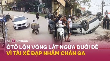 Ôtô lộn vòng lật ngửa dưới đê vì tài xế đạp nhầm chân ga | VnExpress