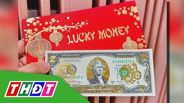 Tiền in hình rồng đắt khách dịp Tết Giáp Thìn 2024 | THDT