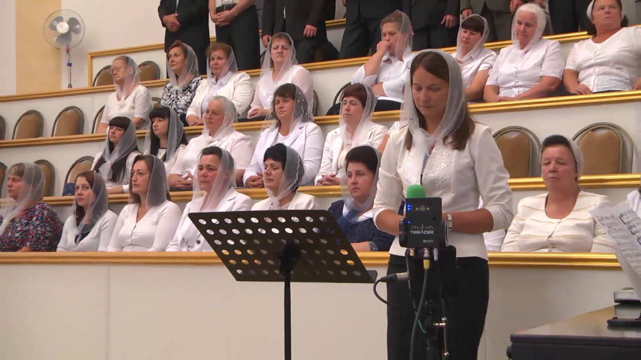 Стою у креста