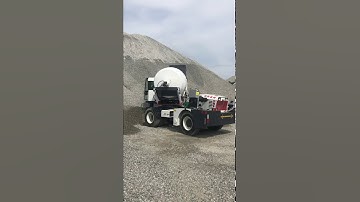 concrete mixer truck with loader for pavement