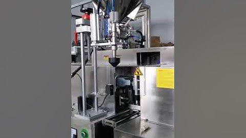 Máy chiết rót và hàn đáy tuýp nhựa