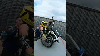 Stunt Rider Performs Ramp And Airbag Jump On Wheelchair