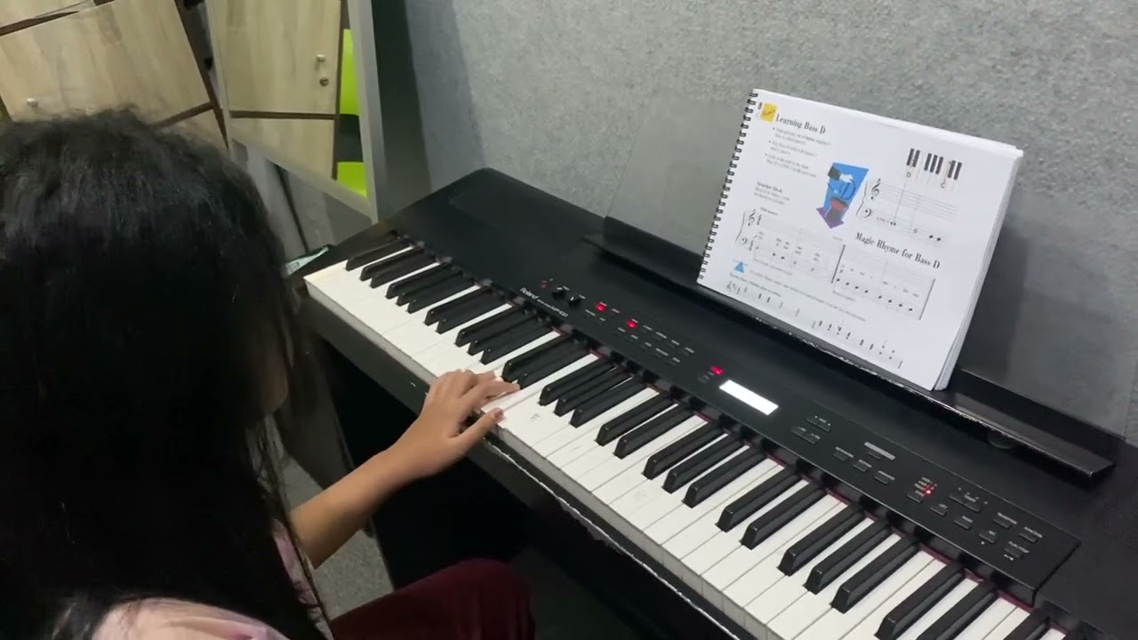 Athifa plays Magic Rhyme for Bass D - Piano Adventures Primer Level Lesson Book