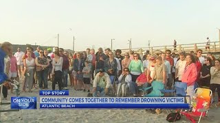 100+ attend vigil for man and boy who died at Atlantic Beach