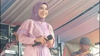 Ayudia bersama Diki musik