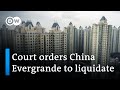 Hong Kong court orders Chinese property developer Evergrande to liquidate | DW News