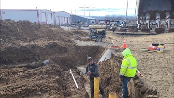 Digging and setting conduit and Sonotubes for Float Controller: On site with Adam Hall