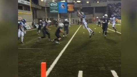 Insane Front Flip Touchdown! High Schooler Leaps Over Defense