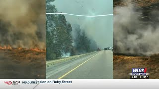 Grassfire covering 100+ acres leads to closure of I-10 in Hancock County