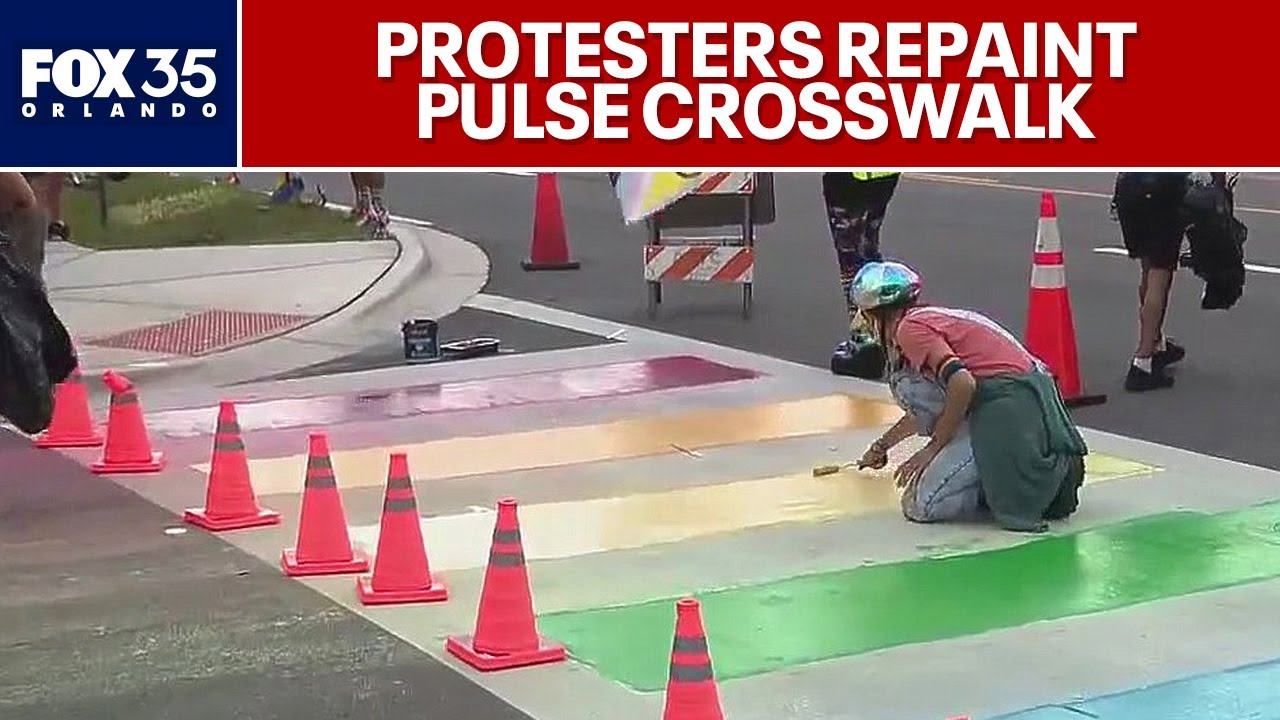 Defiant protesters repaint Pulse Memorial crosswalk in rainbow colors