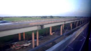 SAM 0438 - Passing NLEX Southbound Elevated Section