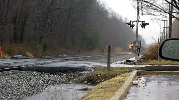 Another CSX Rock Runner, This Time Through Montevideo Road in the Rain