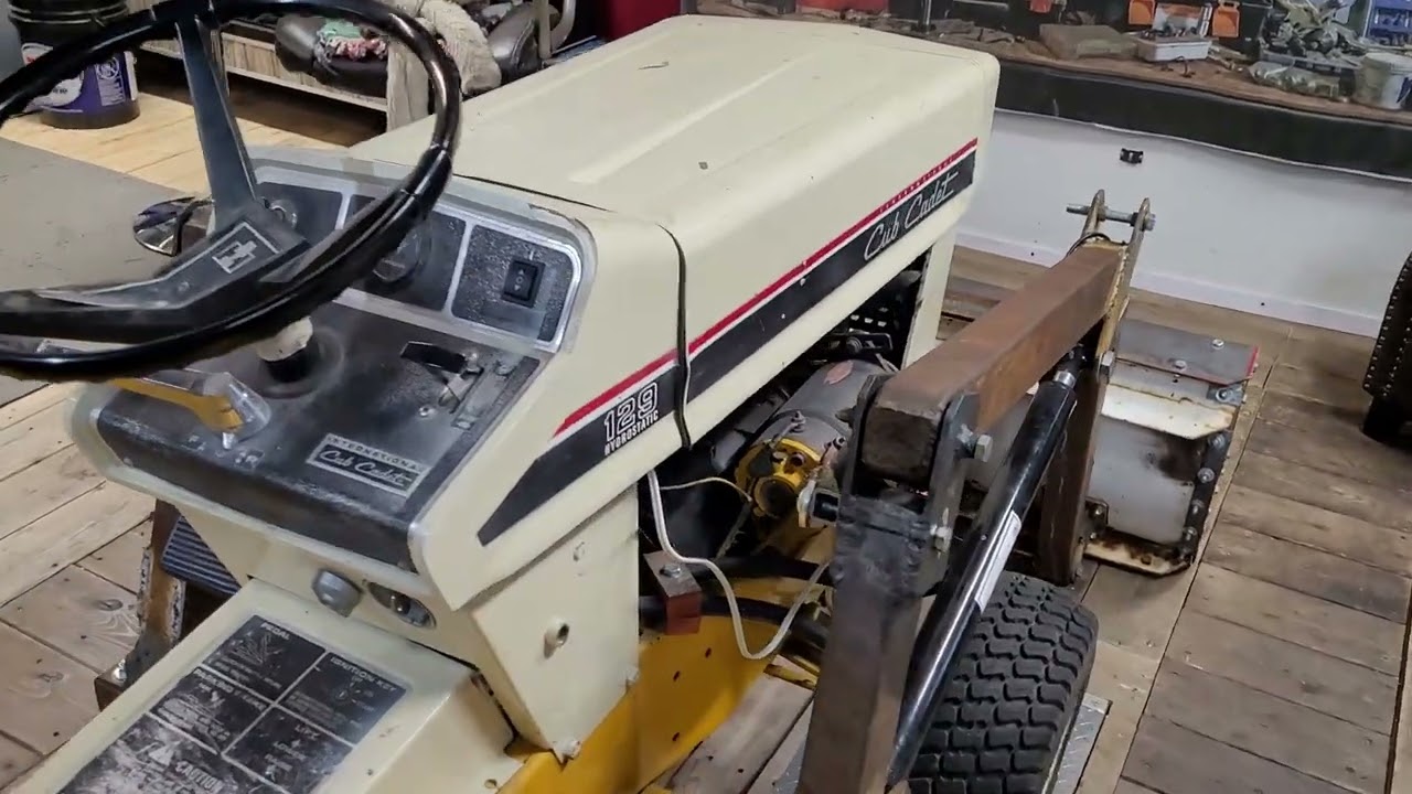 CUB CADET 129 WITH HOMEMADE FRONT LOADER