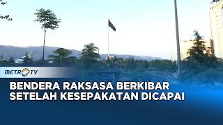 IRAN MENGIBARKAN BENDERA HITAM RAKSASA DI TEHERAN