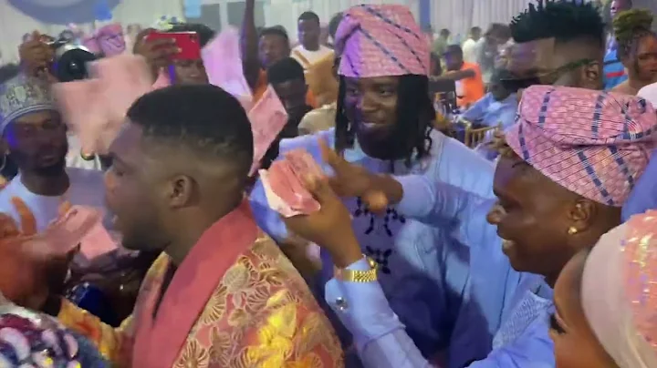 MONEY RAIN ON CUTE ABIOLA AND WIFE AT HIS SON’S NAMING CEREMONY