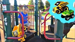 Monster Truck Toy vs Dumptruck Caterpillar Toys Race at the Park Down The Slide Fun Family Playing