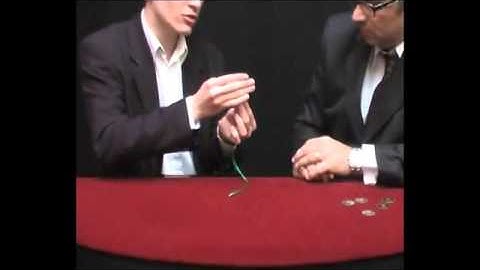 Expanded Shell Chinese Coin made in Brass by Tango  - magictricks.co.uk