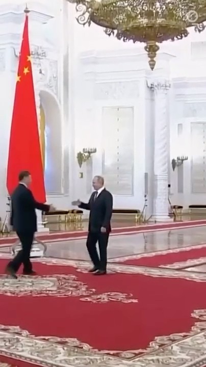 Putin Welcomes China's Xi to Kremlin During Moscow Visit