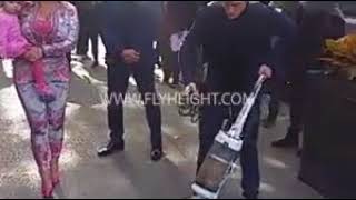 Ice Ts Wife Coco Walking Down New York City With a Man Vacuuming The Streets Before Her!
