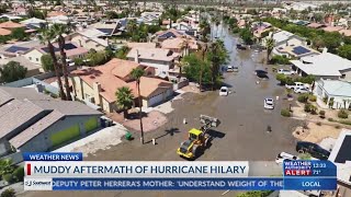 Rains from Tropical Storm Hilary swamp roads, trap cars and flood buildings