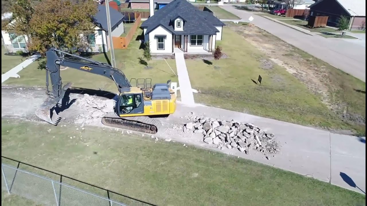 Bringing out the HEAVY equipment for this street demolition project! Removing concrete/asphalt road.