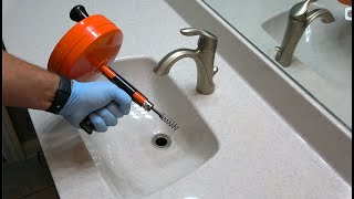 How to Unclog a Bathroom Sink with a Drain Snake - Ridgid Power Spin