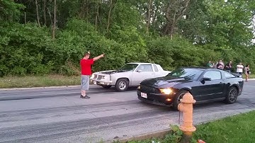 Blue print 383 cutlass racing a coyote Mustang.