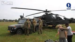 Low Apache fly by + precautionary landing in a field