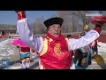 How do Manchu people celebrate Lunar New Year?
