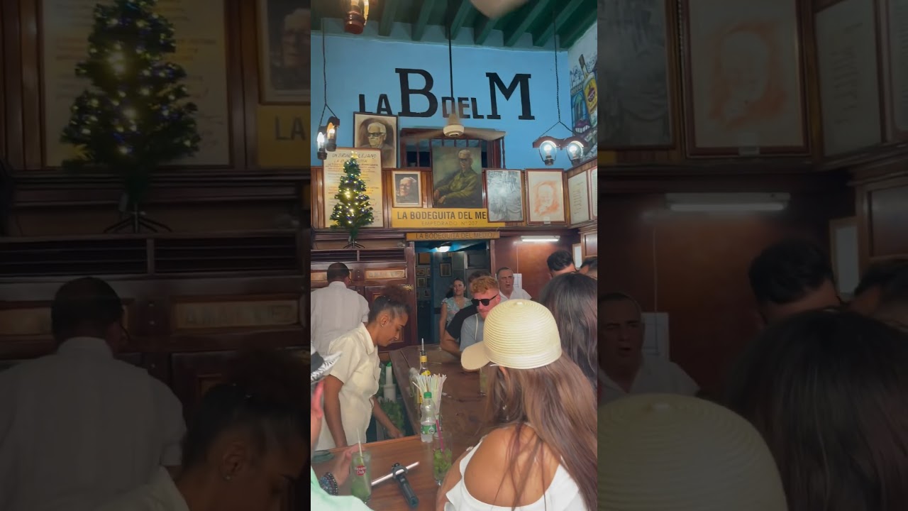 The atmosphere at Hemingway's favorite bar - La Bodeguita del Medio 